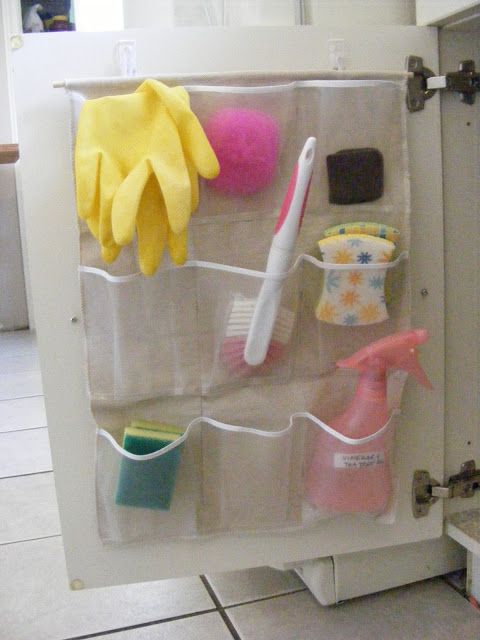 40+ Brilliant DIY Storage and Organization Hacks for Small Bathrooms --> DIY pocket organizer under the sink