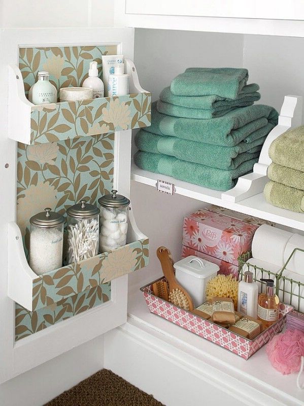40+ Brilliant DIY Storage and Organization Hacks for Small Bathrooms --> Store linens in the cabinets under the sink