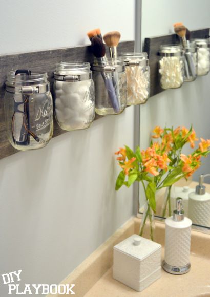 40+ Brilliant DIY Storage and Organization Hacks for Small Bathrooms --> DIY mason jar organizer for bathroom storage