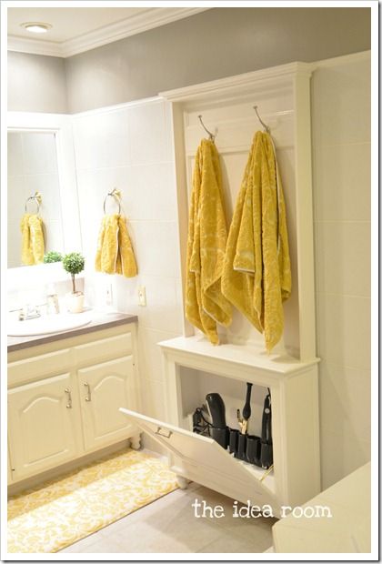 40+ Brilliant DIY Storage and Organization Hacks for Small Bathrooms --> DIY hair tool storage cabinet