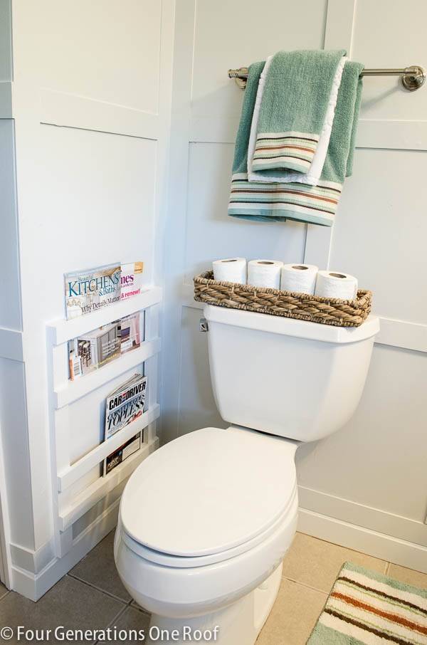40+ Brilliant DIY Storage and Organization Hacks for Small Bathrooms --> DIY bathroom magazine rack