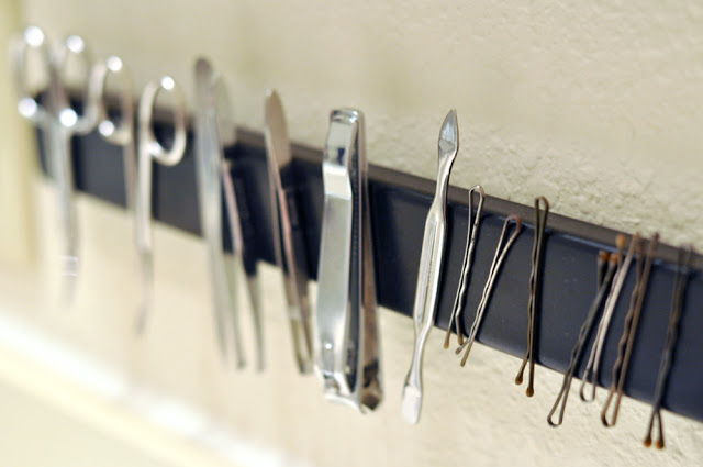 40+ Brilliant DIY Storage and Organization Hacks for Small Bathrooms --> DIY magnetic bathroom rack to store the tiny metal accessories