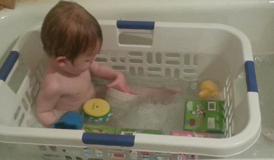 30+ Brilliant Mom Hacks That Will Make Your Life Easier --> Use a laundry basket to make bath time safer and to prevent toys from floating away.