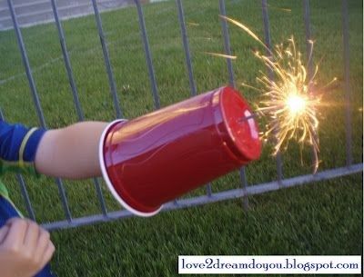 30+ Brilliant Mom Hacks That Will Make Your Life Easier --> Use a plastic cup to keep the little hands safe when they are playing sparklers.