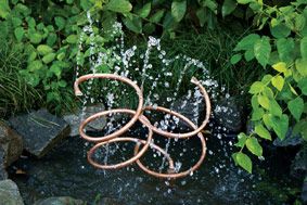 40+ Creative DIY Water Features For Your Garden --> DIY Copper Spiral Water Feature
