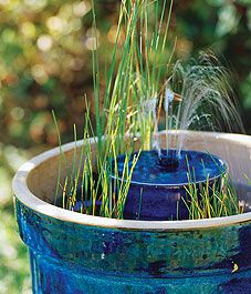 40+ Creative DIY Water Features For Your Garden --> Build a mini water garden oasis